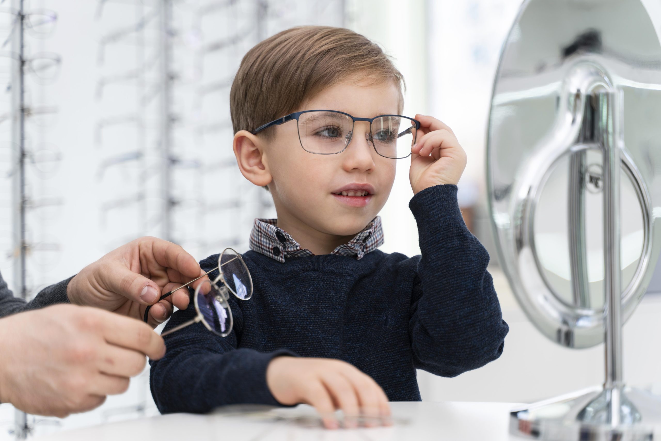 little-boy-store-trying-glasses